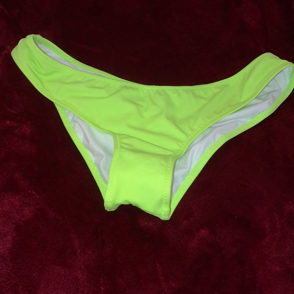 Neon green ruched cheeky bathing suit bottoms